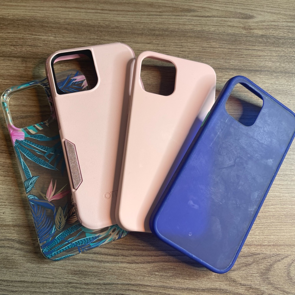 The pink otter box is cracked at the bottom it’s pictured.